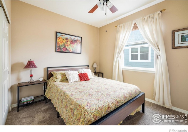 bedroom featuring a closet, baseboards, a ceiling fan, and carpet flooring