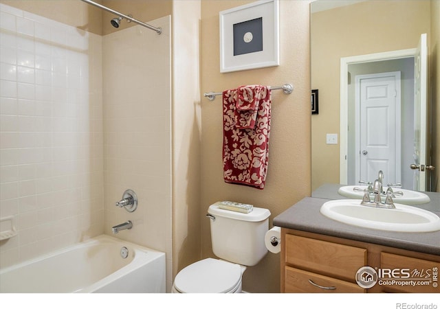 full bath featuring shower / bathtub combination, toilet, and vanity