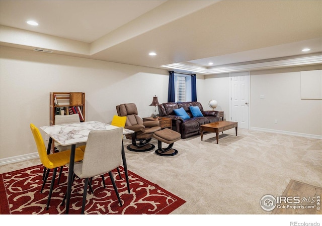 living area featuring a raised ceiling, carpet flooring, recessed lighting, and baseboards