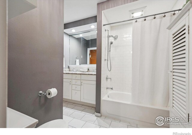 bathroom featuring shower / bathtub combination with curtain, toilet, and vanity