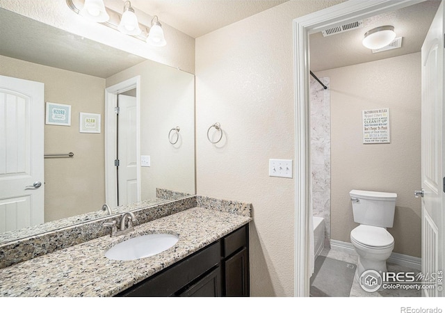 bathroom with visible vents, toilet, tub / shower combination, baseboards, and vanity