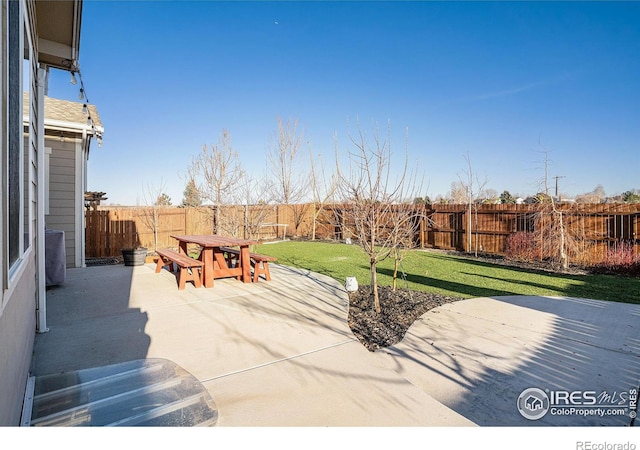 view of patio / terrace featuring outdoor dining space and a fenced backyard