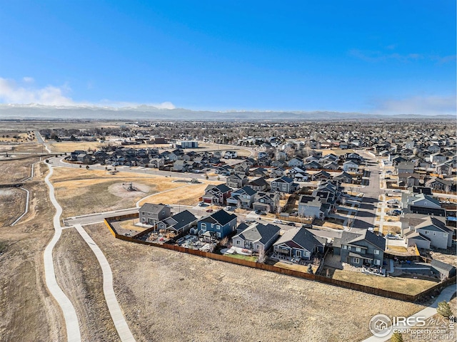 bird's eye view with a mountain view and a residential view