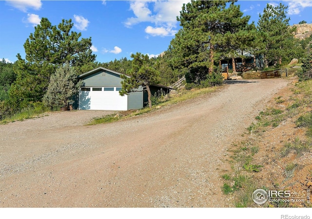 view of street featuring driveway