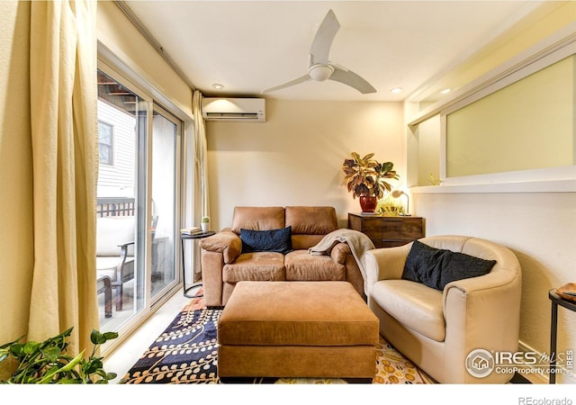 living room with an AC wall unit and ceiling fan