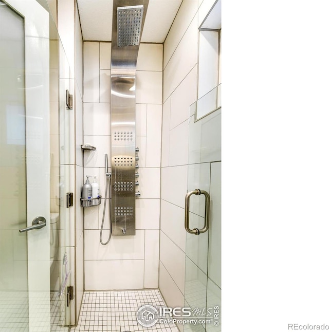 full bathroom with a stall shower