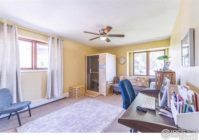 office with a ceiling fan, plenty of natural light, and carpet