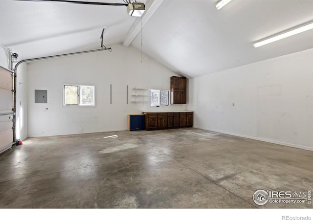 871 E Ln, Estes Park, CO 80517 - garage featuring a garage door opener and electric panel