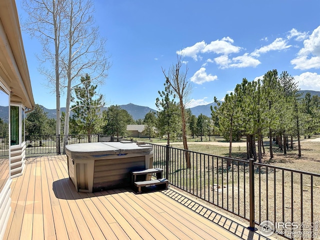 871 E Ln, Estes Park, CO 80517 - wooden deck with a hot tub and a mountain view