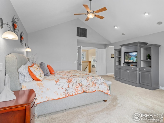 bedroom featuring visible vents, baseboards, carpet flooring, high vaulted ceiling, and a ceiling fan