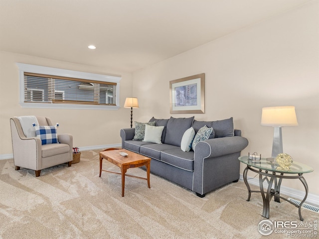 living area with recessed lighting, carpet, and baseboards