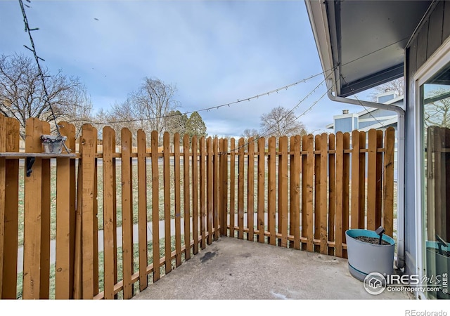 view of patio with fence