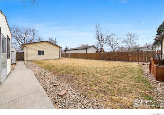 view of yard featuring a fenced backyard