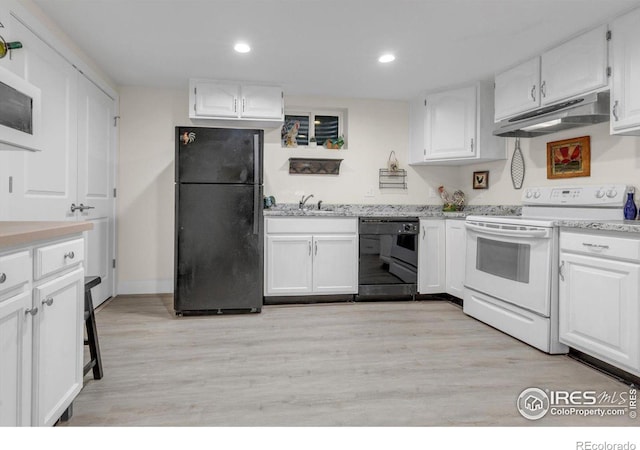 kitchen with under cabinet range hood, light wood finished floors, black appliances, and white cabinetry