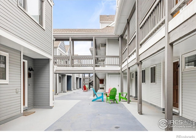 view of patio featuring stairway