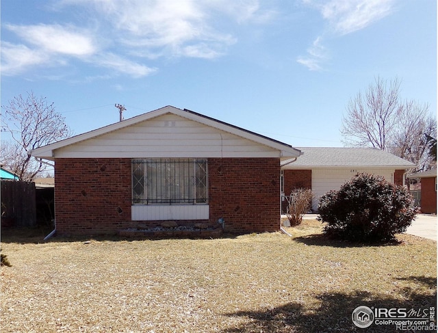 exterior space with brick siding