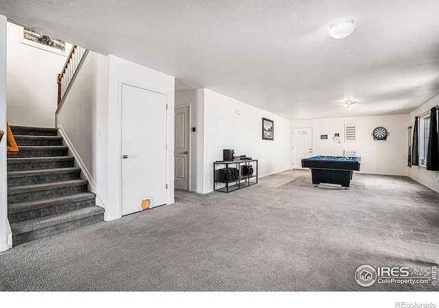 3937 Kenwood Cir, Johnstown, CO 80534 - rec room featuring billiards, carpet, and a textured ceiling