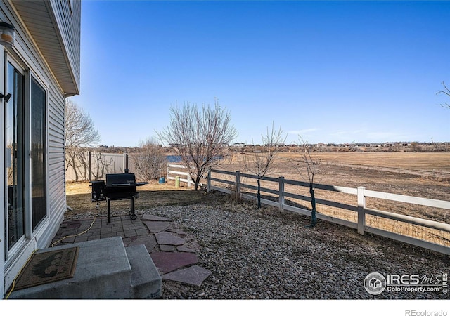 3937 Kenwood Cir, Johnstown, CO 80534 - view of yard with a patio and a fenced backyard