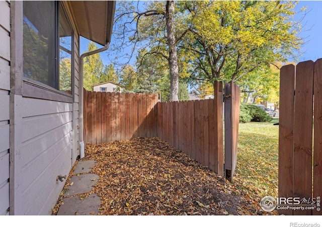 view of yard with fence