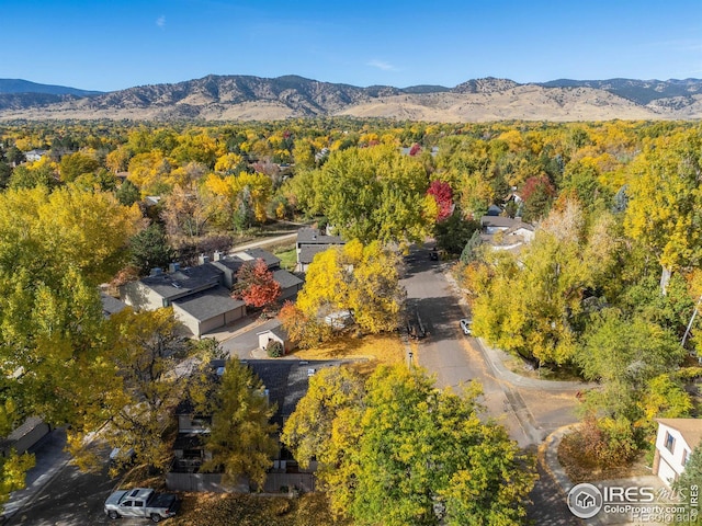 bird's eye view featuring a mountain view and a forest view