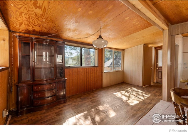 224 Loveland Heights Ln, Drake, CO 80515 - spare room featuring wood walls, wood ceiling, and wood finished floors