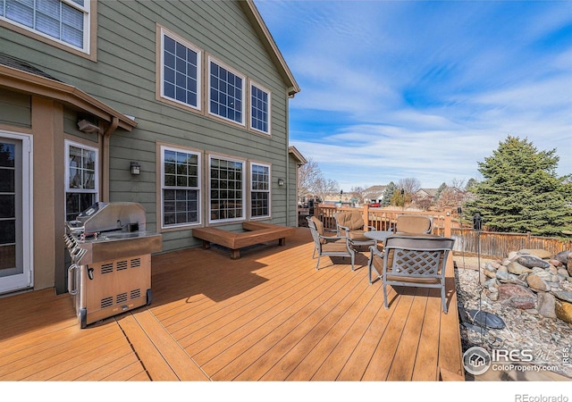 wooden terrace with grilling area