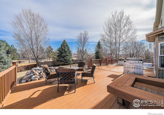 deck featuring a fire pit