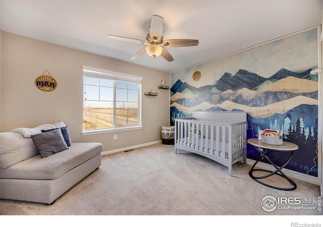 bedroom with visible vents, baseboards, carpet, and a ceiling fan