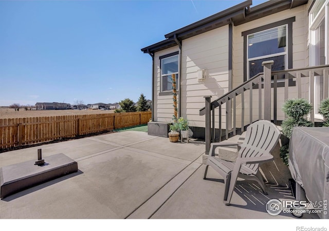 view of patio / terrace with fence