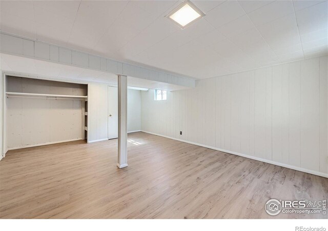 basement with light wood-type flooring