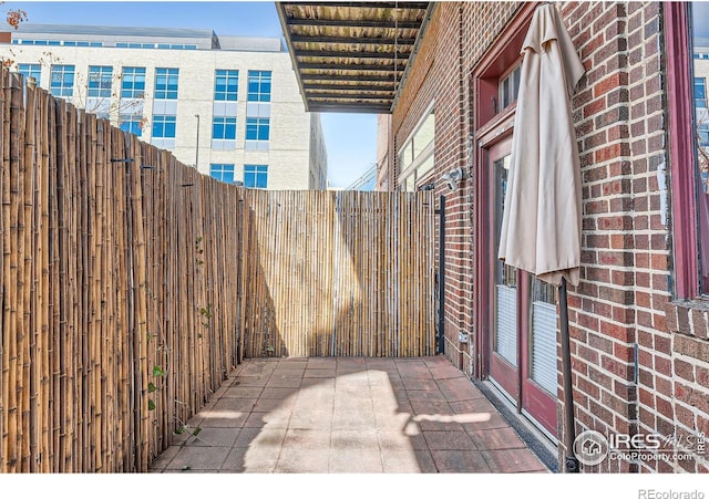 view of patio / terrace with fence