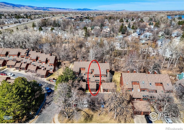 bird's eye view featuring a residential view and a mountain view