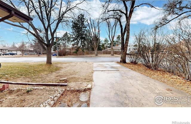 view of yard featuring fence