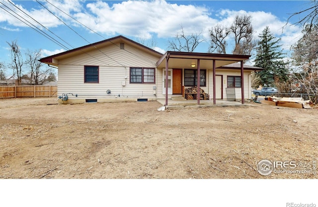 view of front of home with fence