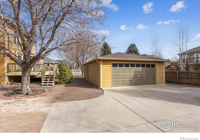 detached garage with fence