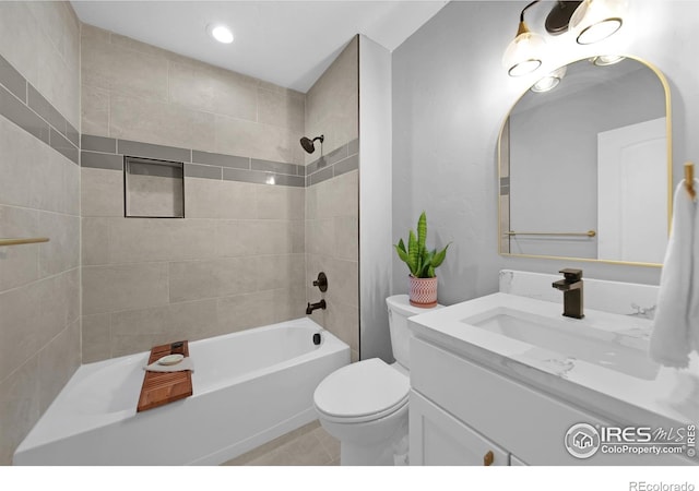 bathroom with toilet, recessed lighting, vanity, tile patterned flooring, and shower / bathtub combination