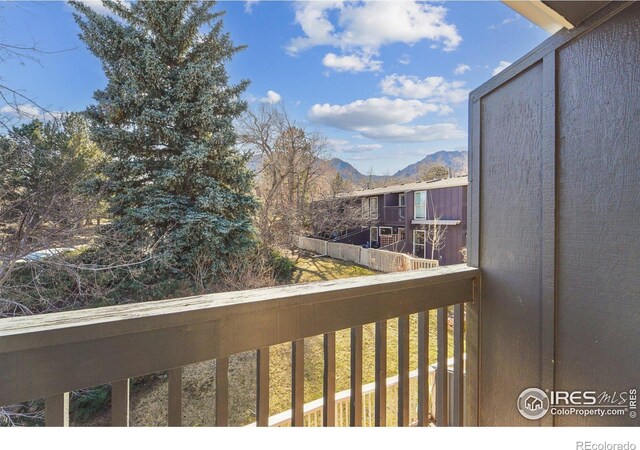 balcony featuring a mountain view