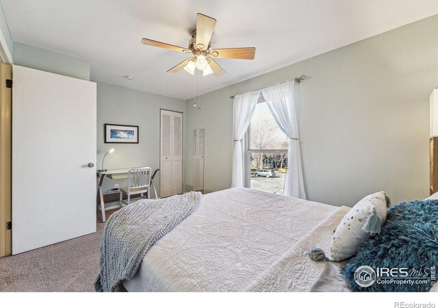 carpeted bedroom featuring a closet and ceiling fan