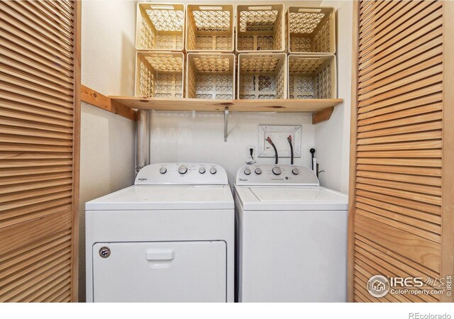 laundry room with laundry area and separate washer and dryer