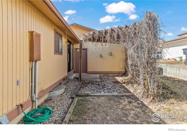 view of yard featuring a patio area and fence