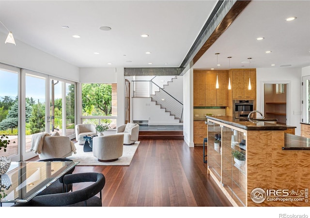 living room featuring recessed lighting, stairway, dark wood finished floors, and french doors