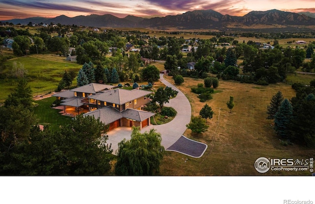 drone / aerial view featuring a mountain view