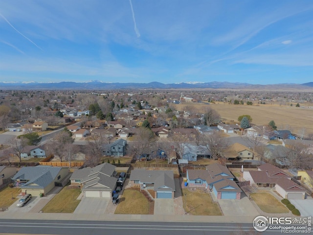 bird's eye view featuring a mountain view and a residential view