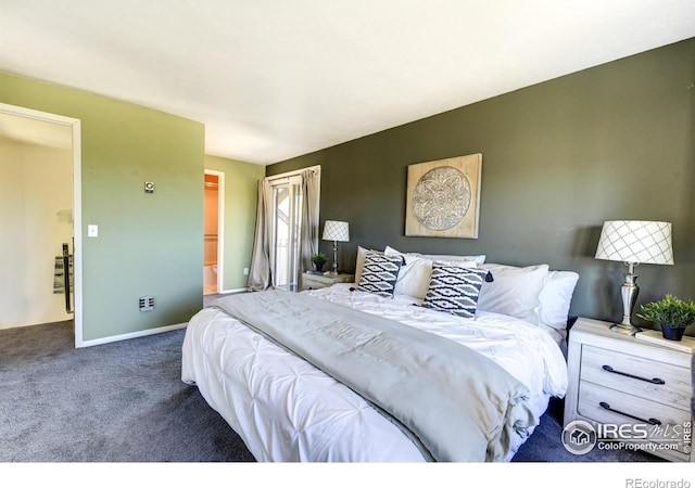 bedroom with baseboards and carpet floors