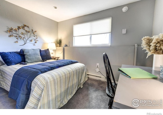 bedroom with a baseboard radiator and carpet floors