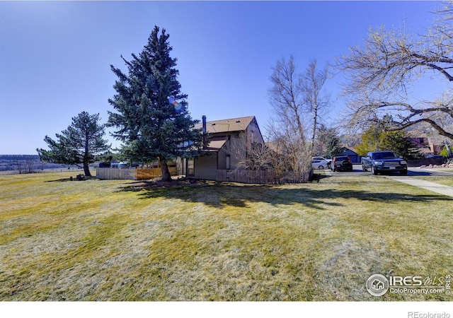 view of yard with fence