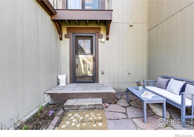 doorway to property featuring a patio