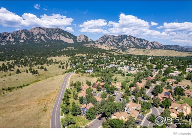 aerial view with a mountain view and a residential view