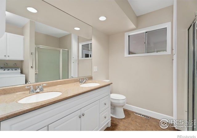 full bath featuring a sink, visible vents, washer / clothes dryer, and a stall shower