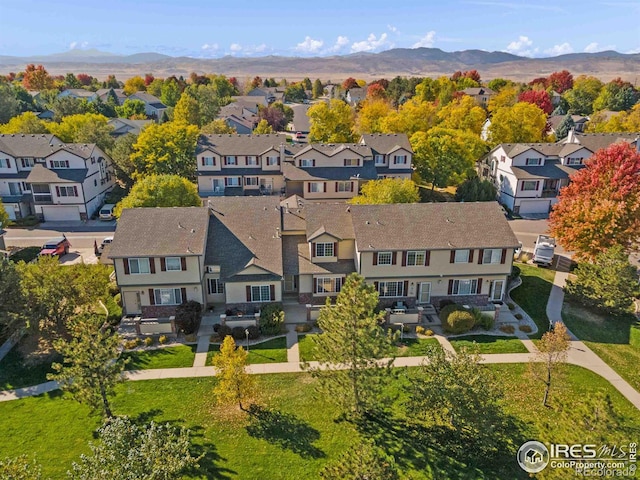 aerial view with a mountain view and a residential view